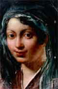 Visage peint en cours de restauration.